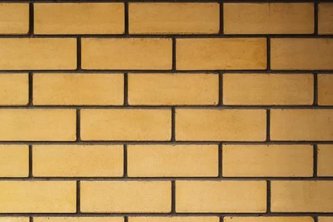 Red brick wall is a guide to the orange background image Stock Photos