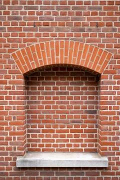 Red brick wall with an inside frame Stock Photos