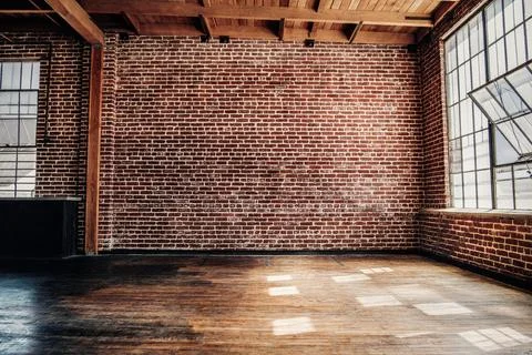 Red brick wall, loft interior design Stock Photos