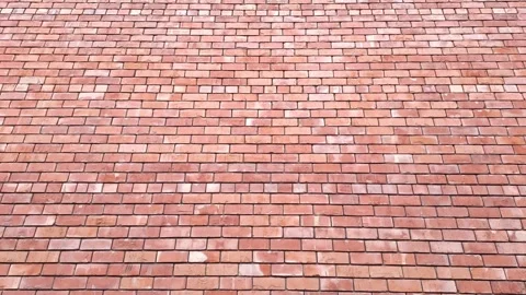 Red brick wall movement from bottom to top Stock Footage 288997623