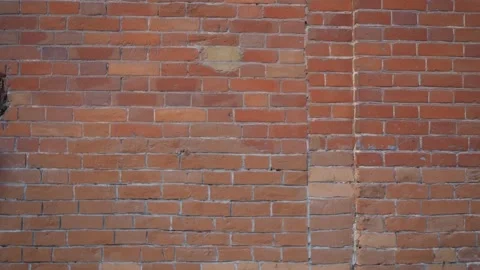 Red brick wall of old brick, Background. Video stock 146826618