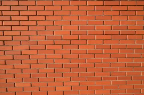 Red brick wall pattern in a daylight Foto stock