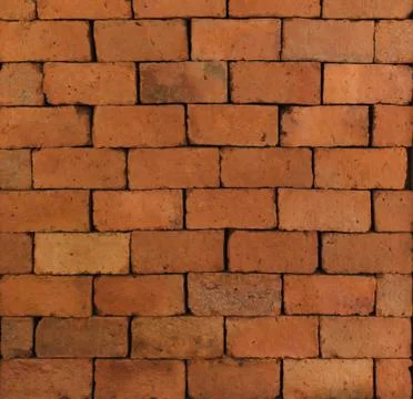 Red brick wall pattern surface texture. Close-up of interior material for des Stock Photos