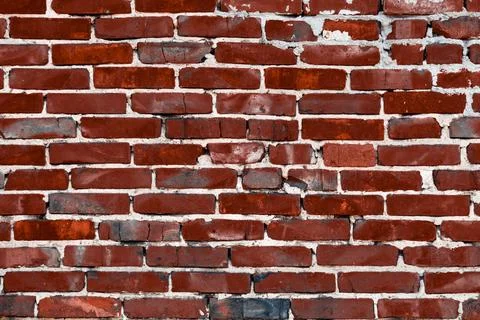 Red brick wall. Place for text. The texture of the wall. Stock Photos
