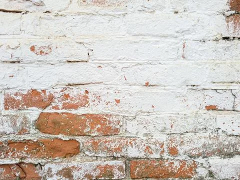 Red brick wall with plaster Foto stock