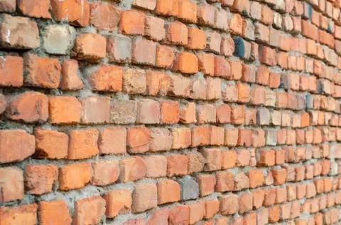 Red brick wall in receding perspective. Geometric composition of rectangular  스톡 사진
