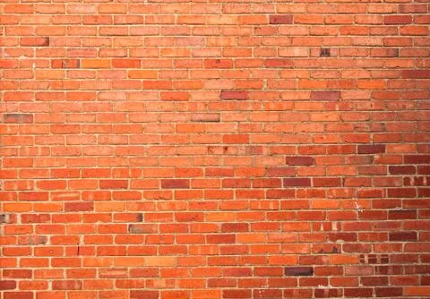 Red brick wall seamless background Stock Photos