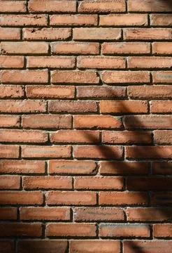 Red Brick Wall with Shadow Texture Background Stock Photos