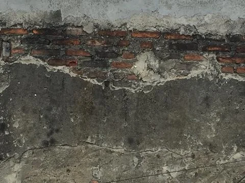 The red brick wall is still in progress Stock Photos