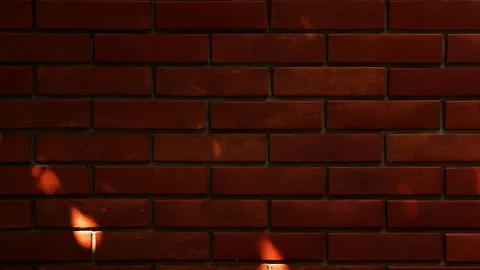 Red brick wall sun reflection Stock Footage 92974153