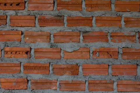 Red brick wall texture allowing the picture to be tiled for background Stock Photos