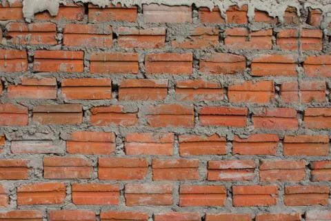 Red brick wall texture allowing the picture to be tiled for background Stock Photos