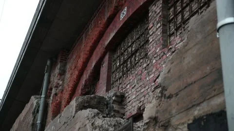 Red brick wall as texture background. High flat wall of an old building. Stock Footage 132005654