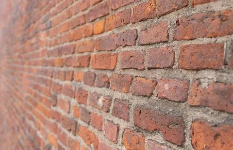 Red brick wall texture background with weathered bricks Stock Photos