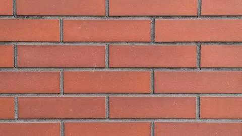 Red Brick Wall Texture Background with Dark Mortar Joints Stock Photos