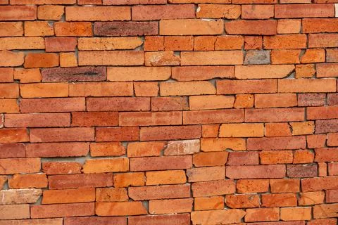 Red brick wall texture background.Decorative tiles.High quality photo. Stock Photos