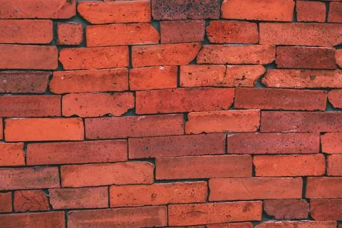 Red brick wall texture background.Decorative tiles.High quality photo. Stock Photos