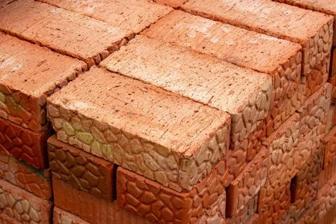 Red brick wall texture close up selective focus Stock Photos