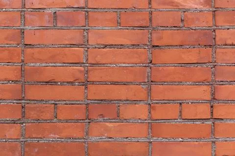 Red brick wall texture closeup Stock Photos