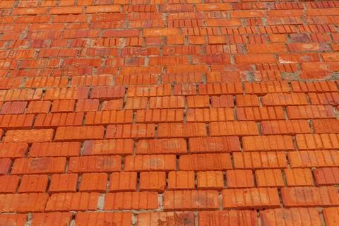 Red brick wall texture. Old retro building background copy space. Orange bric Stock Photos