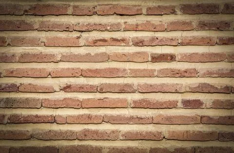Red brick wall. Texture of old dark brown and red brick wall backgorund. Stock Photos