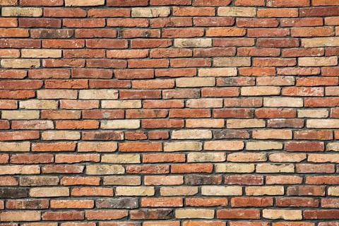 Red brick wall textured background Stock Photos