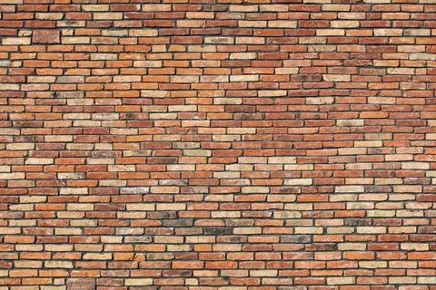 Red brick wall textured background Stock Photos