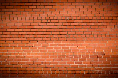 Red brick wall with vignette texture background Stock Photos