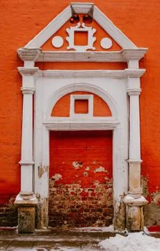 Red brick wall with white decorations Stock Photos