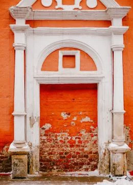 Red brick wall with white decorations Stock Photos