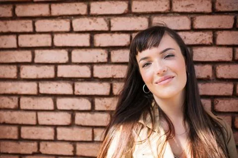 With red bricks in the background Stock Photos