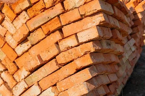 Red bricks for construction. Red brick is used in the construction of houses. Stock Photos