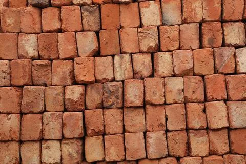 Red Bricks at construction site India Stock Photos
