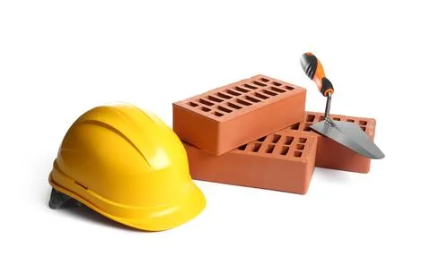 Red bricks, hard hat and trowel on white background Stock Photos