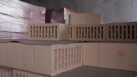 Red bricks in a pallet at a construction site Stock Footage 178122380