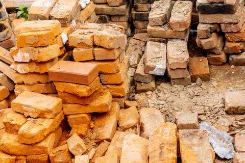 Red bricks pile. stack for construction. Repair, industrial brickwork parts,  Stock Photos