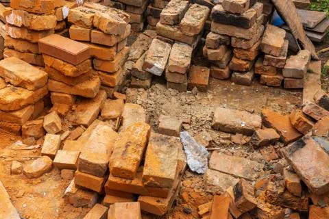 Red bricks pile. stack for construction. Repair, industrial brickwork parts,  Stock Photos