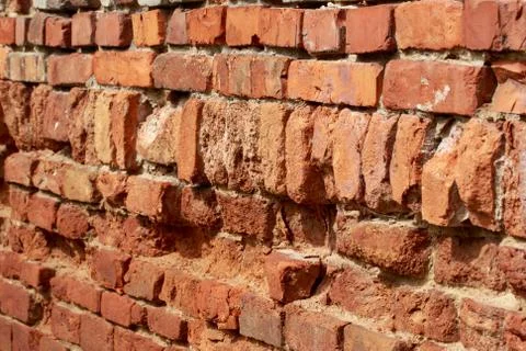 Red bricks stacked in rows Stockfoto's