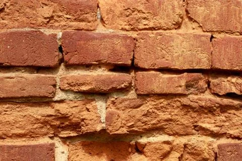 Red bricks stacked in rows Stockfoto's