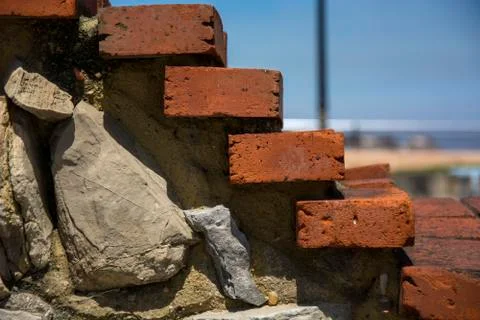 Red bricks, stone and selective focus Stock Photos