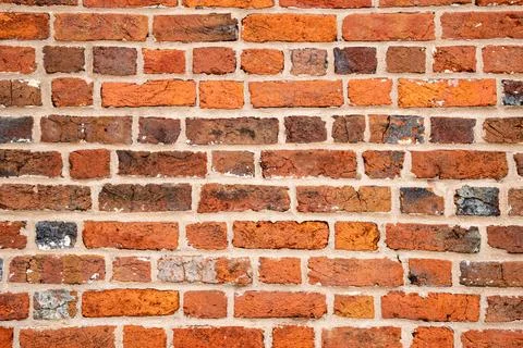 Red bricks wall texture background. Vintage bricks brick wall surface pattern Stock Photos