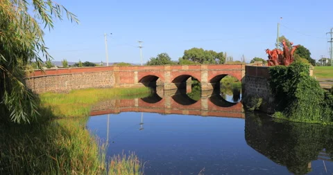Red Bridge, built in 1838 by convict labour, Campbell Town, Tasmania, Australia Stock Footage 163024159