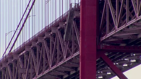 Red bridge deck, tower and suspender cable closeup Stock Footage 48560875