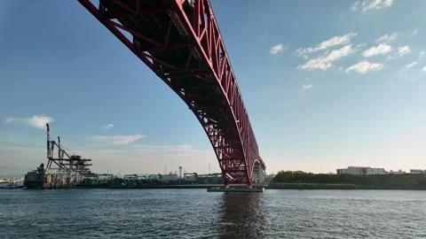 Red bridge , Minato Bridge in Osaka.the symbol of Osaka Harbor Stock-Footage 289751685