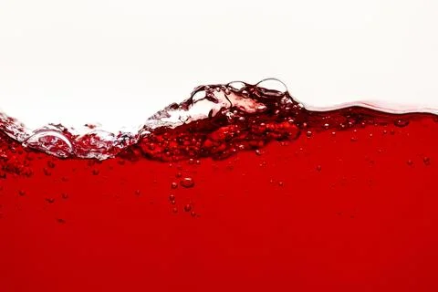 Red bright liquid splash bubbles Stock Photos