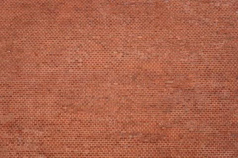 Red brown brick wall, texture grunge background, may use to interior design Stock Photos