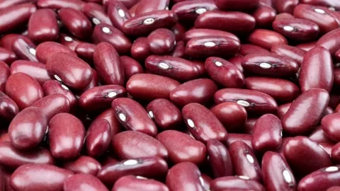 Red-brown kidney beans close-up in rotating motion Stock Footage 262978525