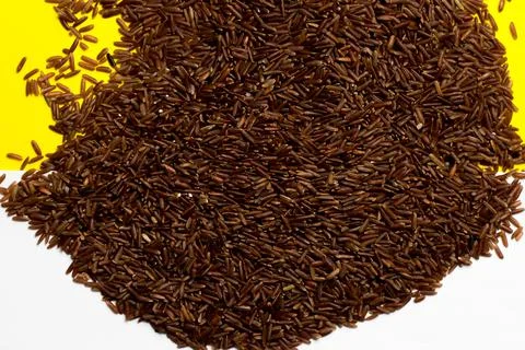 Red brown rice close up. Stock Photos