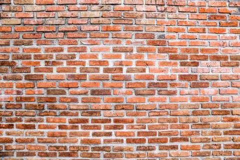 Red Brown stone bricks in a row Stock Photos