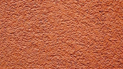 Red-brown,concrete wall, surface texture plaster for background Stock Photos